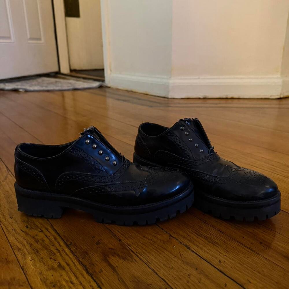 Vintage black leather brogues
